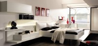 nowoczesna czarno biała sypialnia z czerwonymi akcentami
